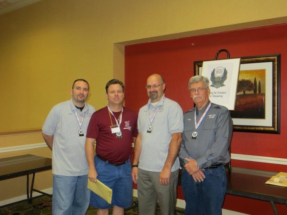 Picture of Dean Koeneman receiving his honors at the NBTSG.